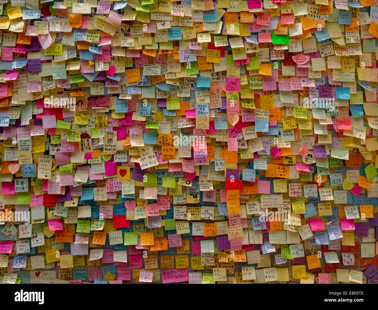 Hong Kong, China. 9th October, 2014. Messages of support for the pro-democracy protests are posted on the walls of the Tamar  government building. The wallhas become known as 'Lennon Wall' and now contains thousands of messages of support for the pro democracy protesters. Stock Photo