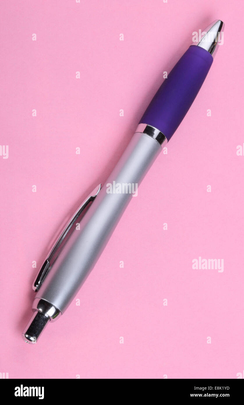 Ball Pen on Pink Background Stock Photo
