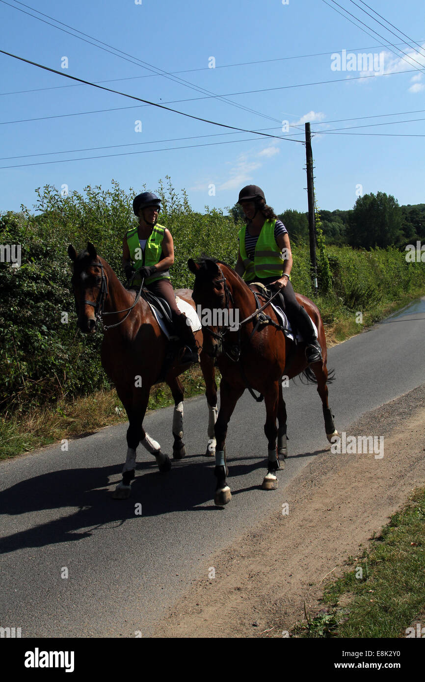 Two riders out hacking/riding Stock Photo