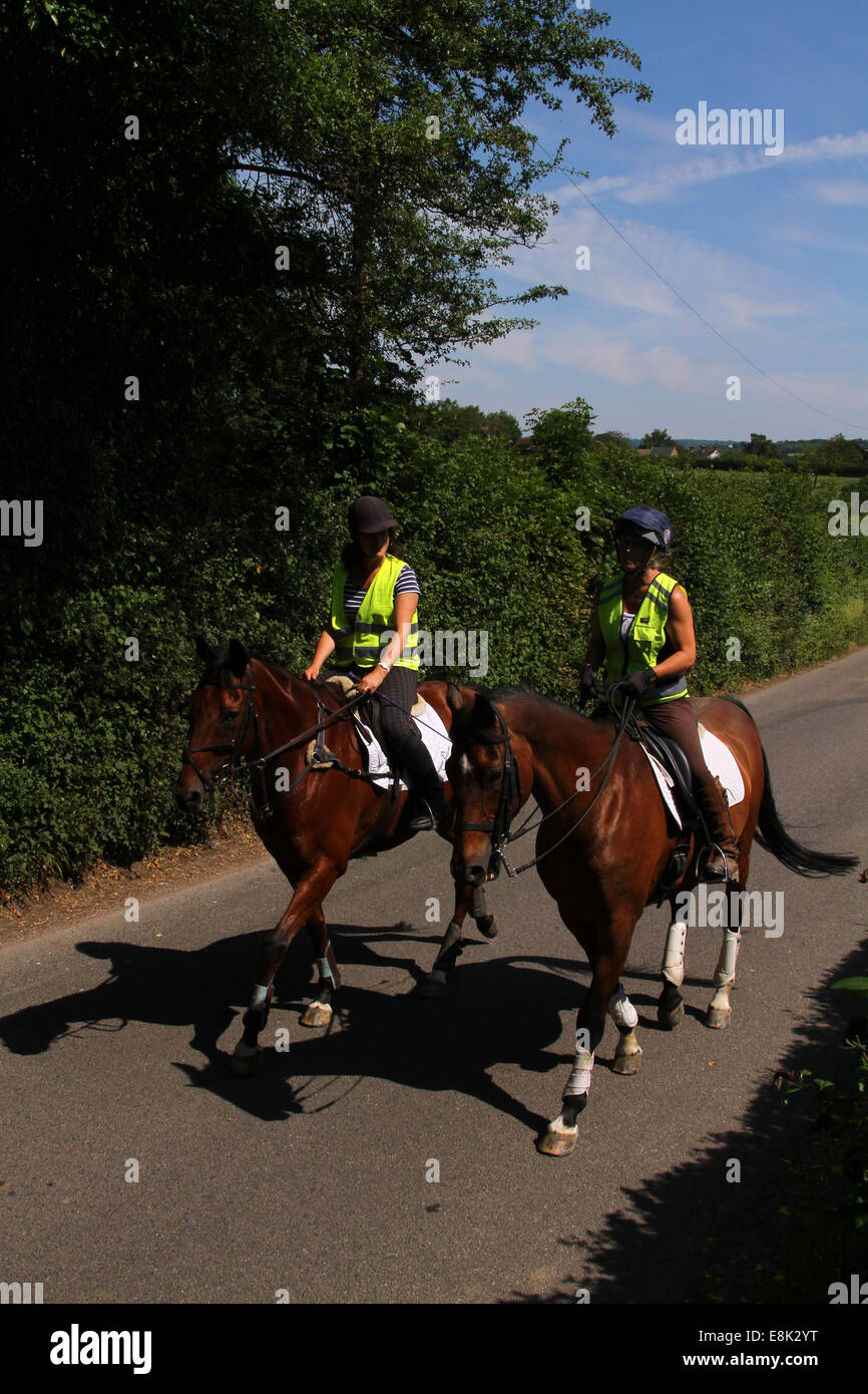 Two riders out hacking/riding Stock Photo - Alamy