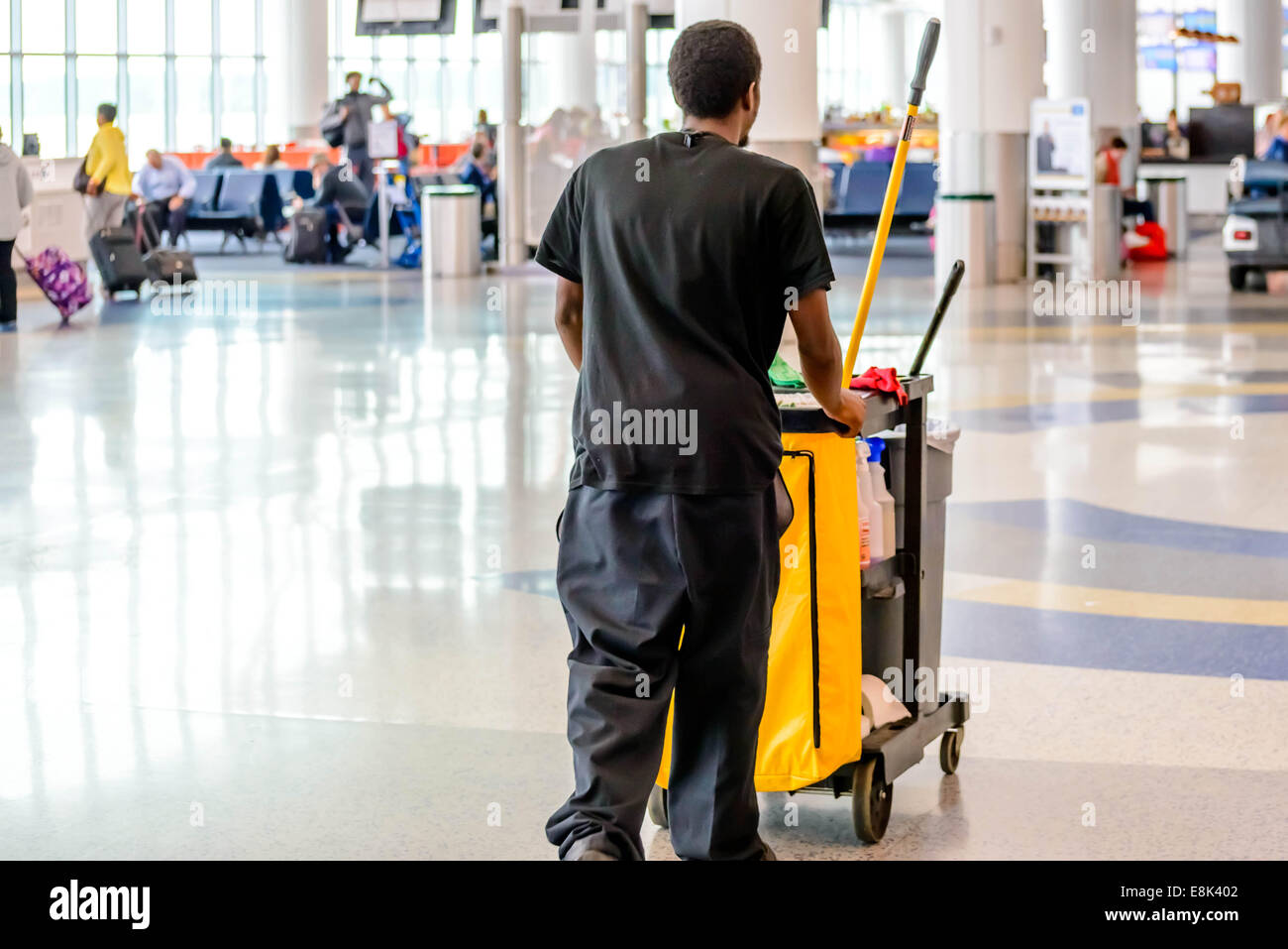 IAH, Houston Intercontinental Airport, Houston, TX, USA cleaning man