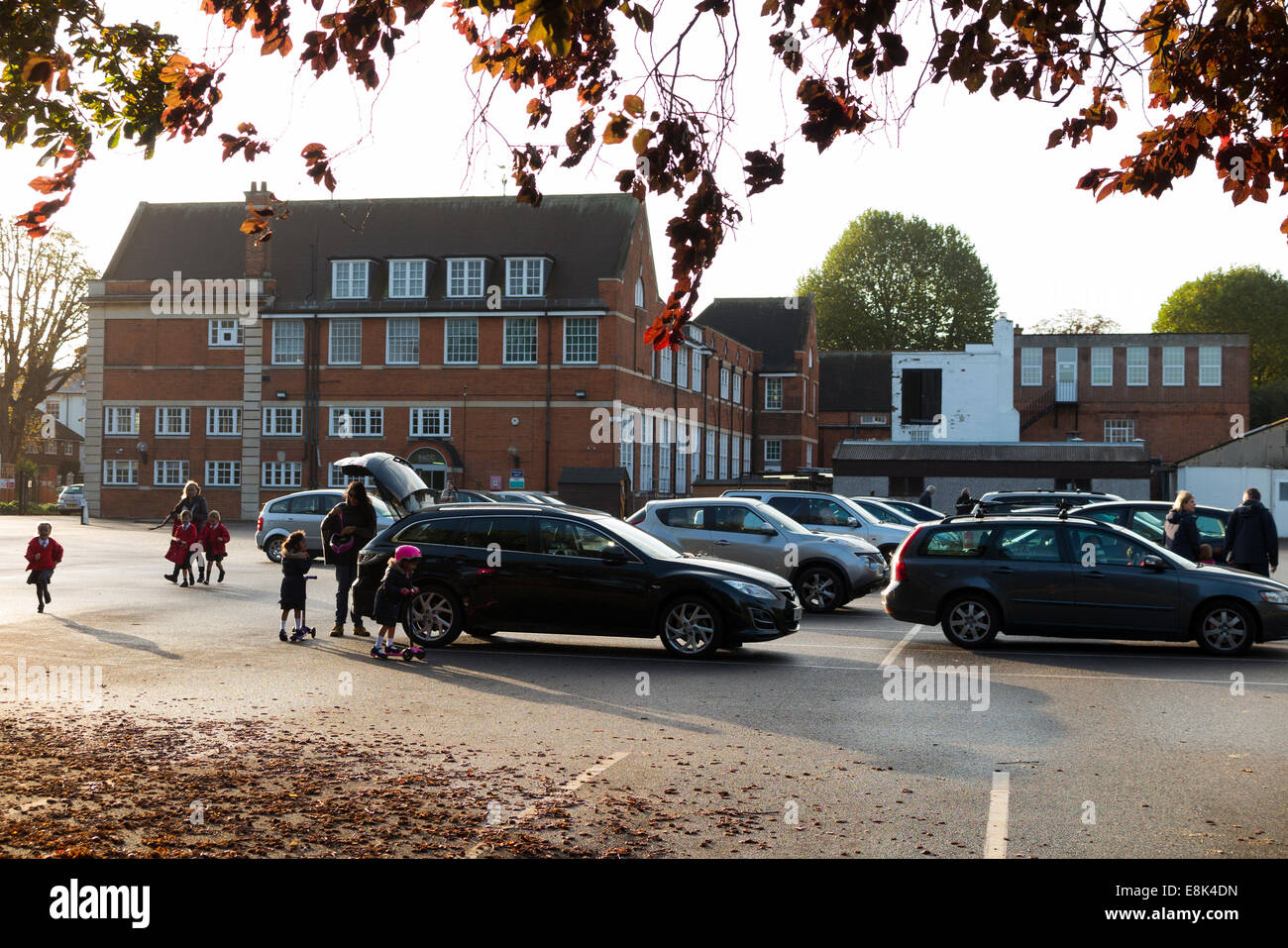 School car park during term time / cars parking in the morning drop off ...