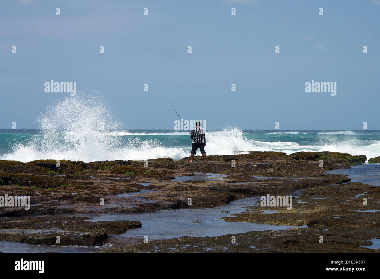 Angler at Mission Rocks - iSimangaliso Wetland Park, South Africa Stock Photo