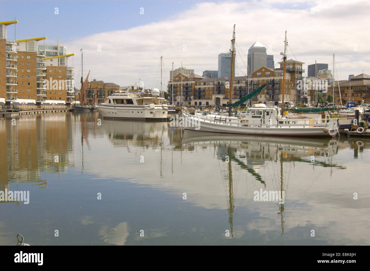 Docklands skyline and yacht in Limehouse marina in London, England Stock Photo