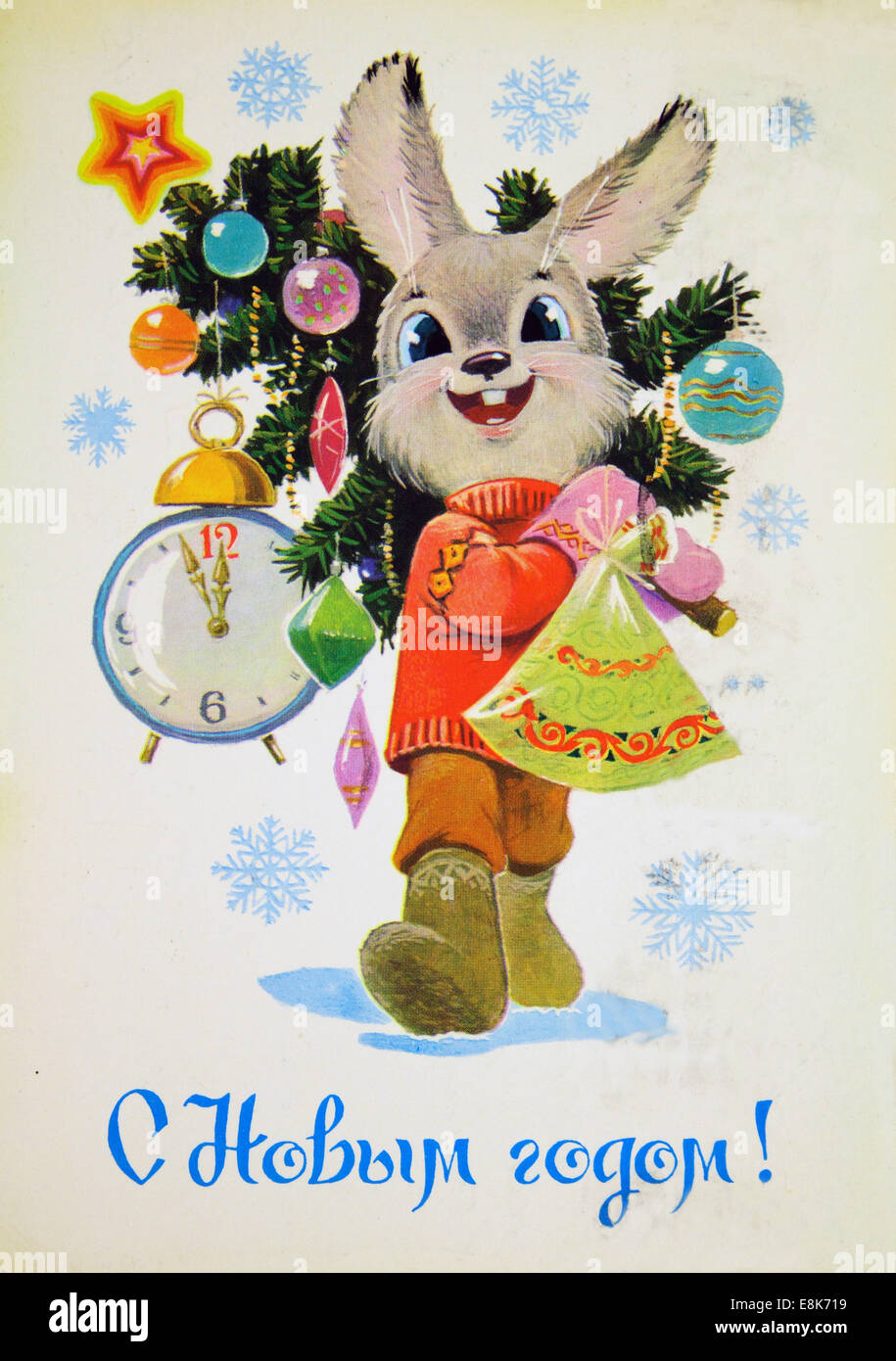 Dec. 2, 2009 - Reproduction of antique postcard shows rabbit with Christmas spruce, gifts and clocks showing the midnight, circa 1963, USSR. (Credit Image: © Igor Golovniov/ZUMA Wire/ZUMAPRESS.com) Stock Photo