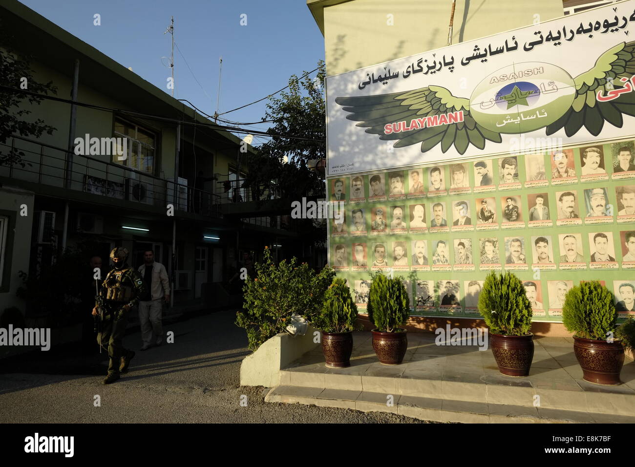A memorial wall for fallen security personal at the courtyard of the headquarters of the Kurdish intelligence security unit of the Asayiş or Asayish the Kurdish security organization and the primary intelligence agency operating in the Kurdistan region in Iraq. City of Sulaymanieh or Sulaymaniyah Northern Iraq. Stock Photo