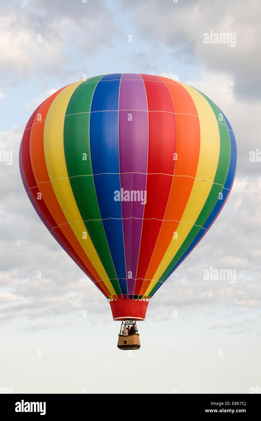Colorful Hot Air Balloon Among the Clouds Stock Photo