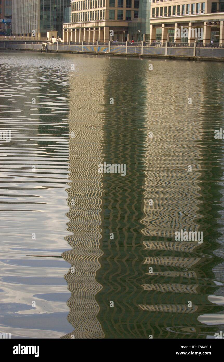 Reflection in the dock at Heron Quays in London, England Stock Photo