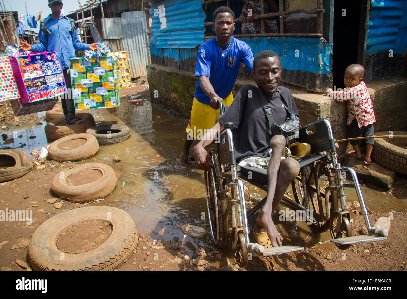Nabieu dumbuya in wheelchair adult literacy teacher kroo bay