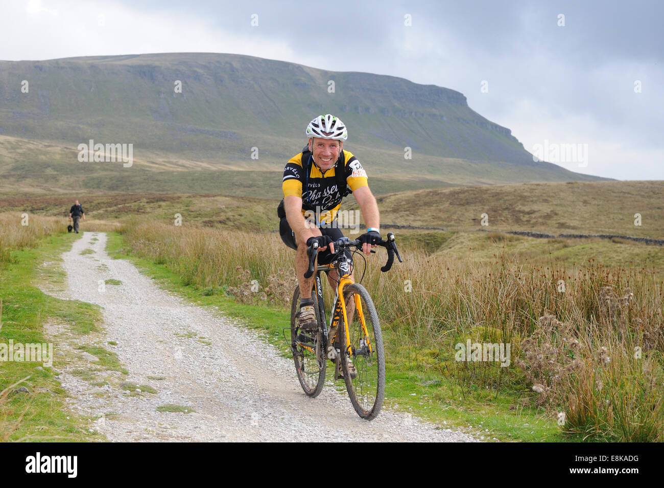 rider in the three peaks cyclocross race with Pen y Gent in the background Stock Photo