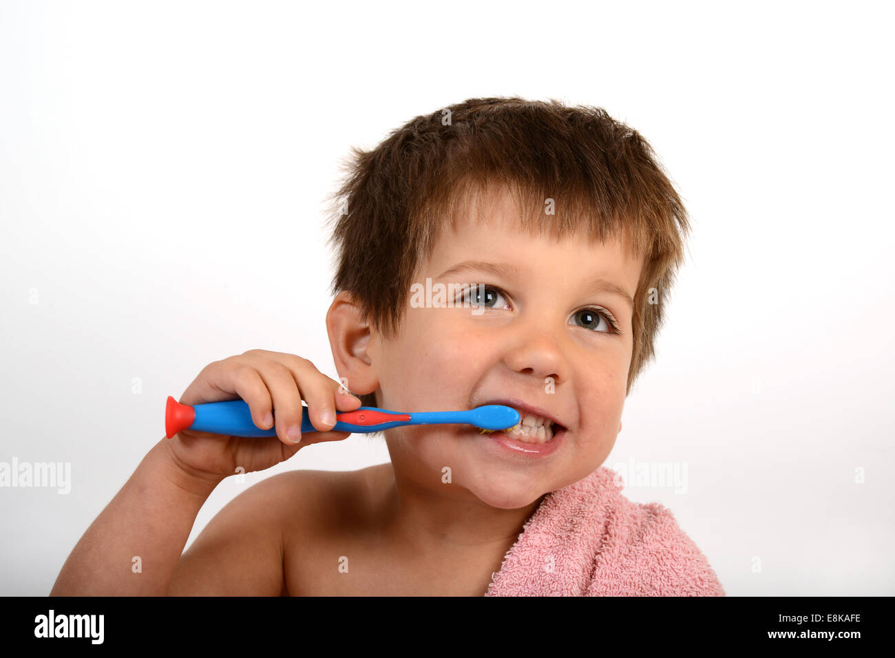 Young boy child children cleaning brushing teeth Stock Photo