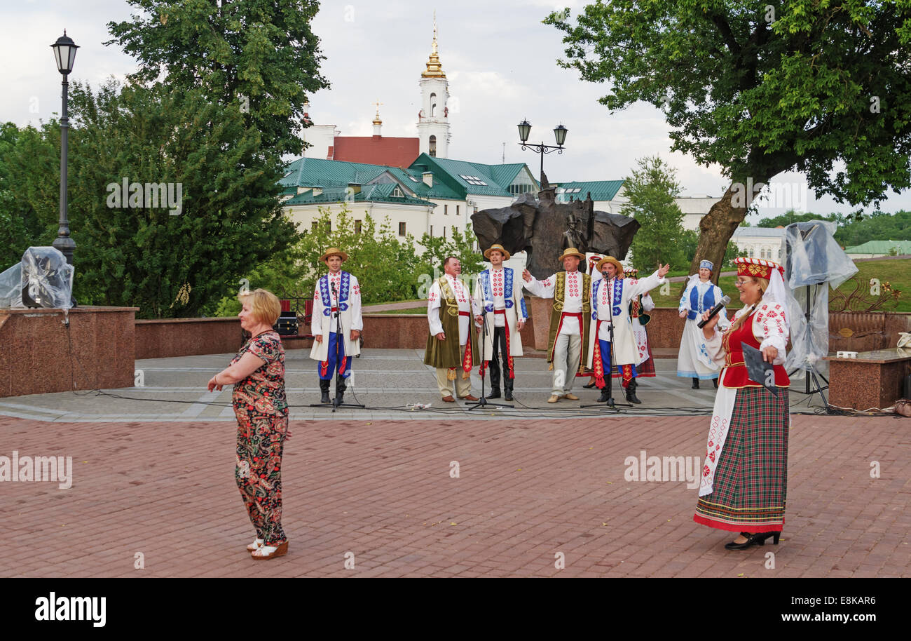 The Belarus folklore groups dance and sings on streets in Vitebsk Stock