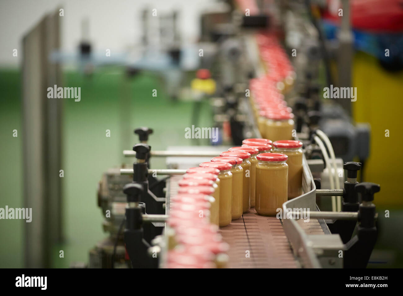 Peanut Butter Manufacturing production plant line in the family business factory floor of Duerr's Jams warehouse Wythenshawe, Manchester, England, UK. Stock Photo