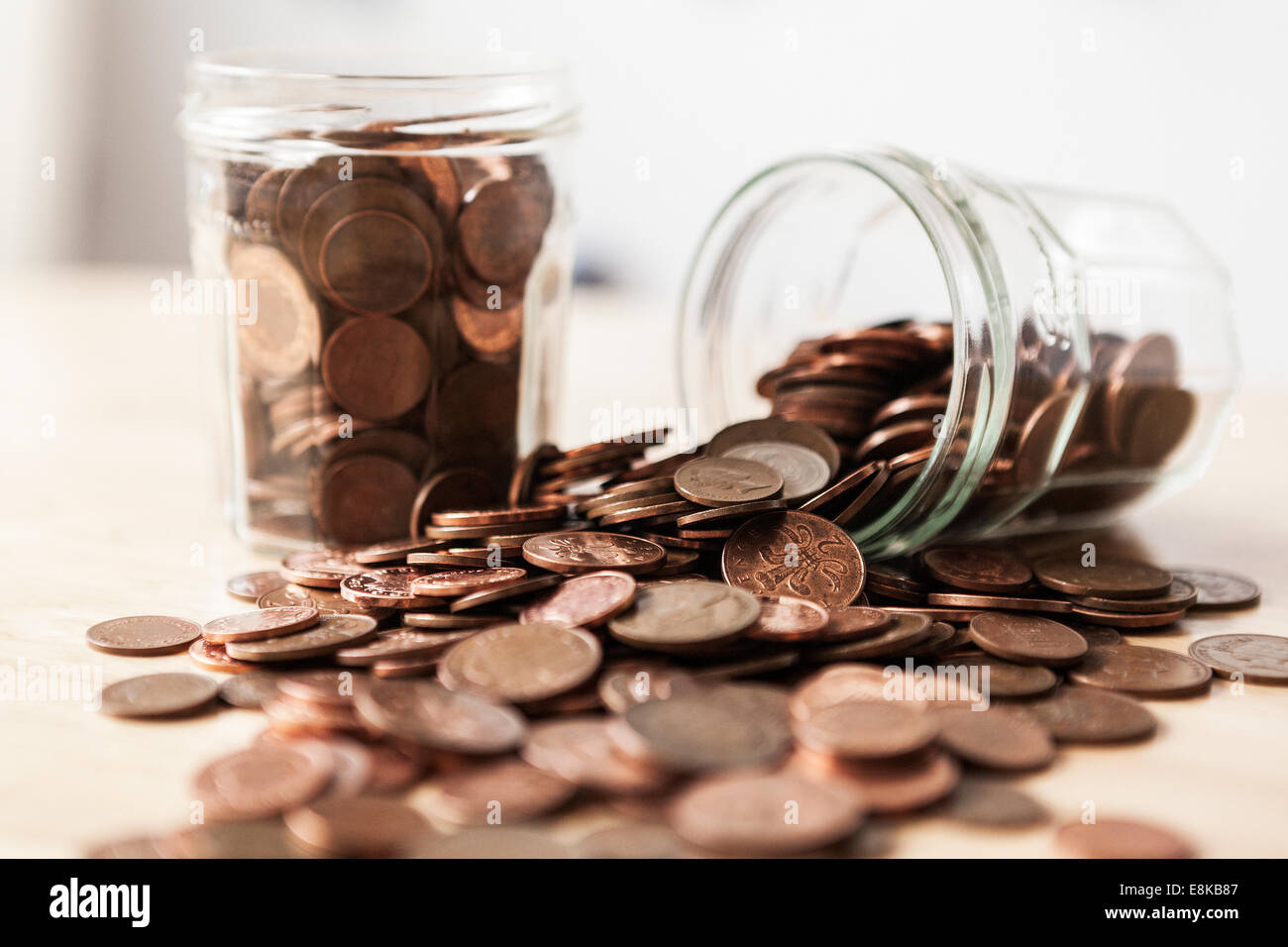 Penny Jar- UK pennies in a jar Stock Photo