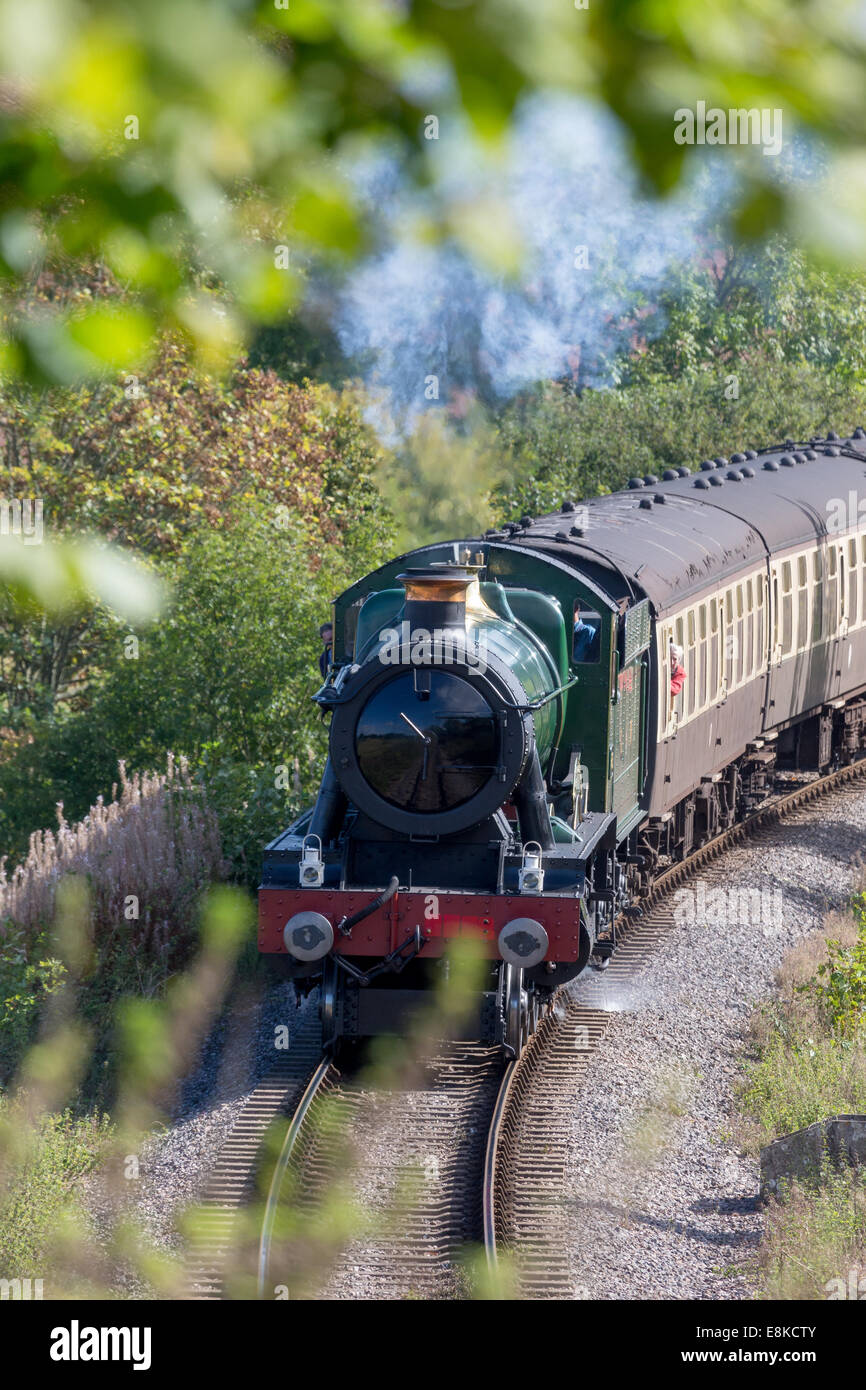 6960 GWR Raveningham Hall pulling the train to Minehead through Combe Florey on the West Somerset Railway Autumn Steam Gala Stock Photo