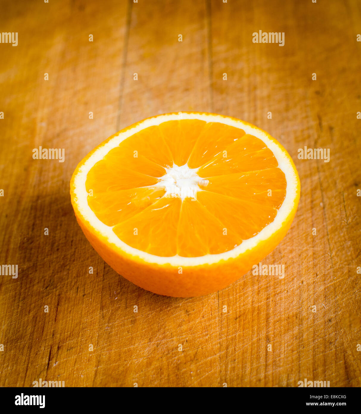 Orange fruit cut in half Stock Photo Alamy