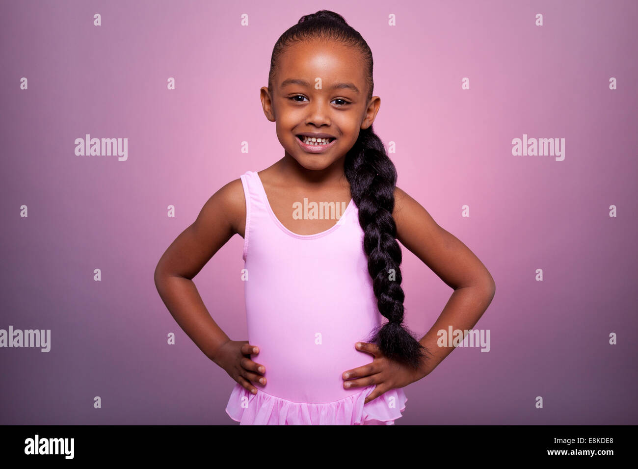 Portrait of a cute little African American girl dancing Stock Photo - Alamy