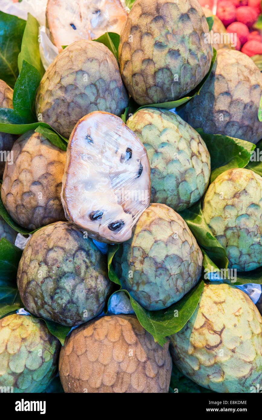 pile of candy colored green cherimoya Stock Photo
