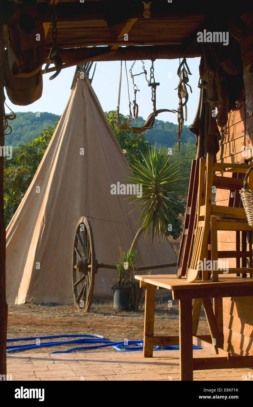 Native American Tipi in a horse ranch setting. Sun drenched rustic ...