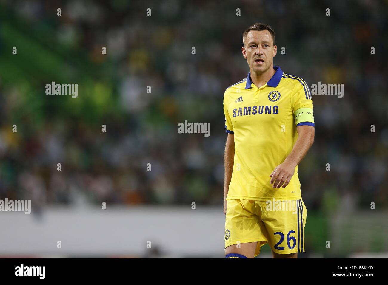 07.03.2013 Bucharest Romania..FC Steaua Bucuresti versus Chelsea Europa  League Football knock-out stages 1/8 finals. John Terry wins a powerful  header with John Obi Mikel Chelsea between Raul Rusescu(L) and Leandro Tatu  (r)