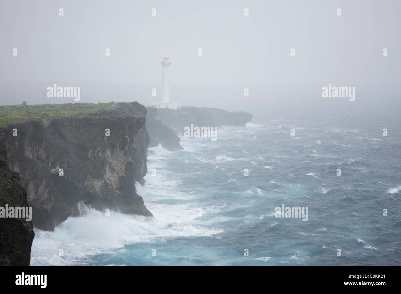 Cape Zanpa, Okinawa, Japan. The approach of Typhoon Vongfong brings wind, rain and rough seas. Oct 10, 2014  Locals are getting ready for the possibility of extreme and damaging winds. Credit:  Chris Willson/Alamy Live News Stock Photo