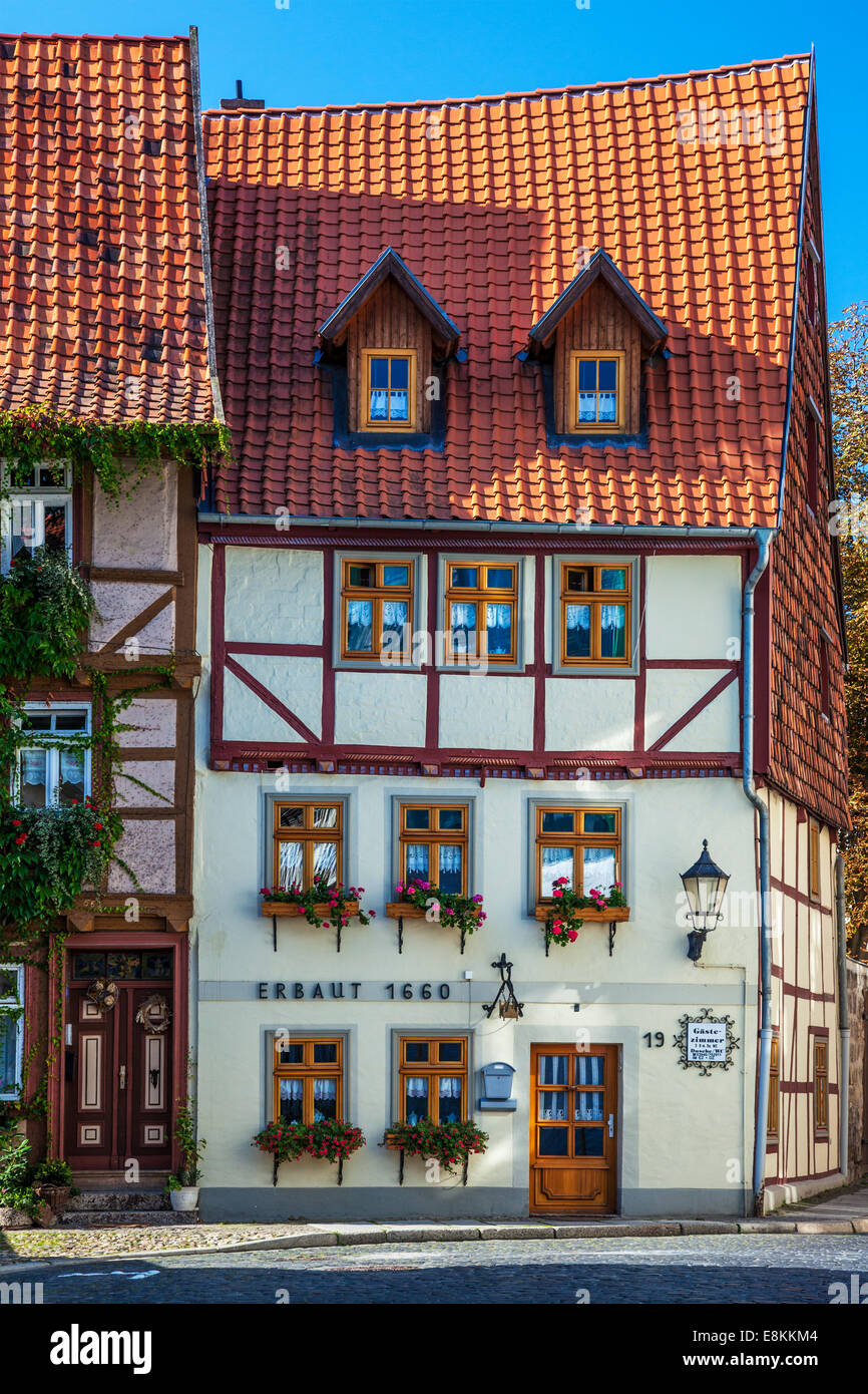 A pretty half-timbered medieval guest house in the UNESCO World Heritage town of Quedlinburg, Germany. Stock Photo