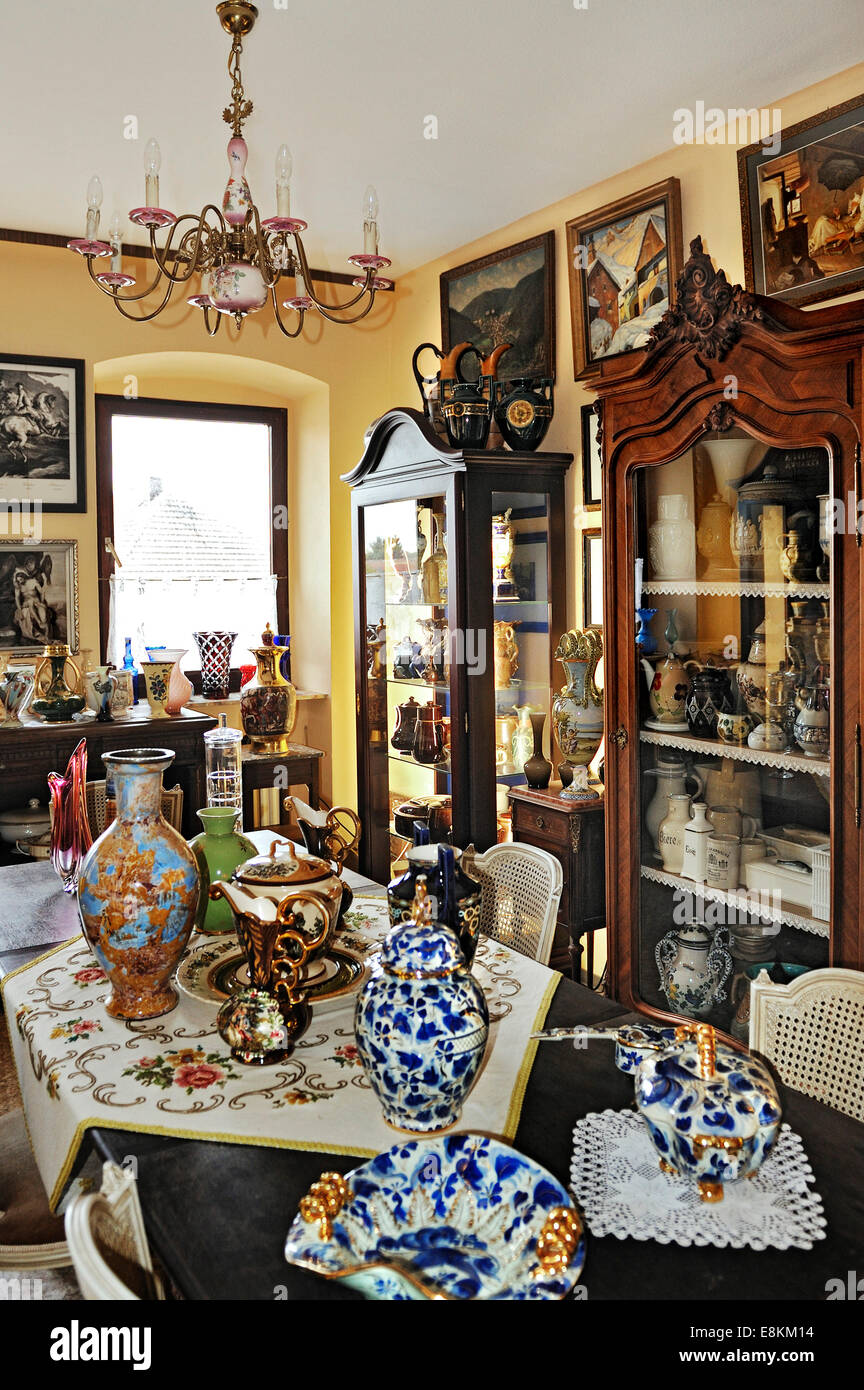 Old vases, glasses, and display cases in a private collection Stock