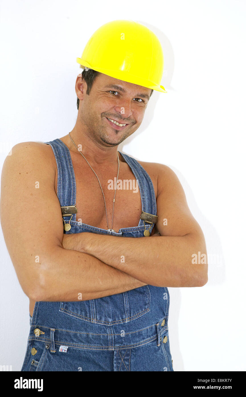 Handwerker In Latzhose Mit Schutzhelm High Resolution Stock Photography And Images Alamy
