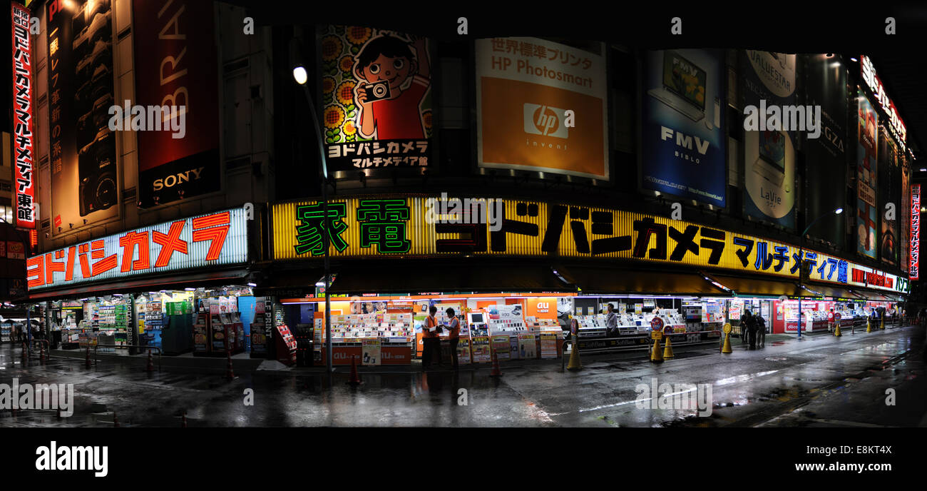 Camera and electronic shops at night in Shinjuku, Tokyo, Japan. Stock Photo