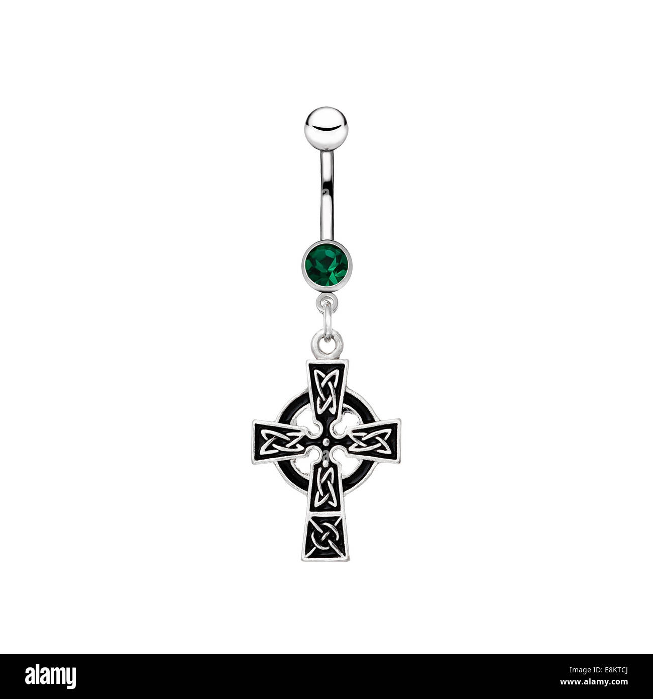Silver piercing in the shape of celtic cross Stock Photo