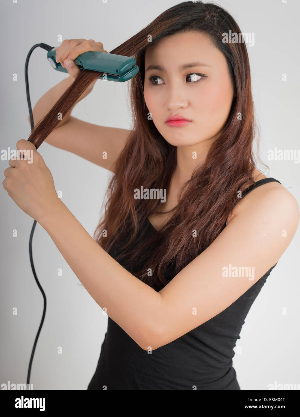Cute Asian Girl Hair Straightening Frustration Stock Photo Alamy