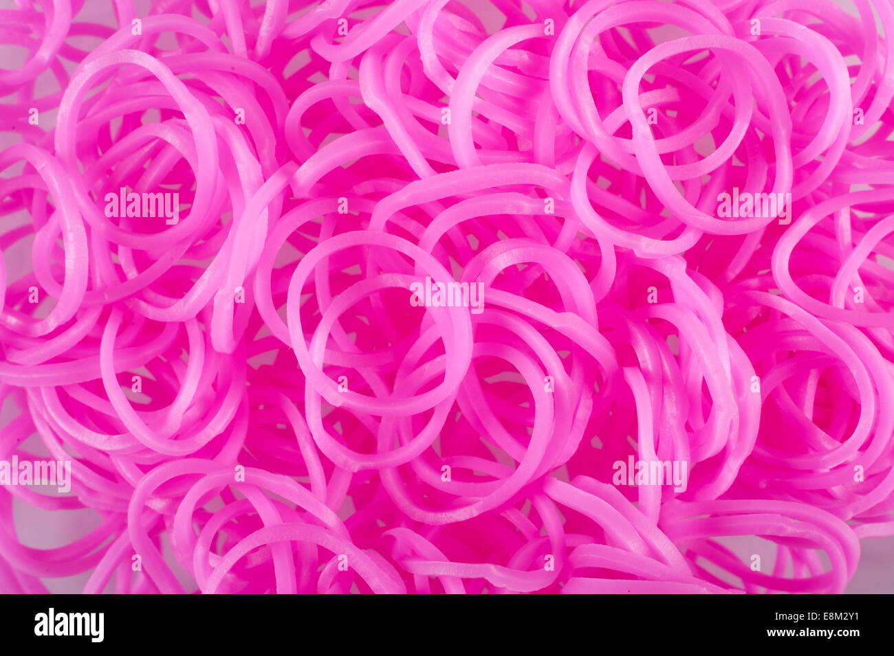 Bright pink Loom Bands. Detail. Close up. Stock Photo
