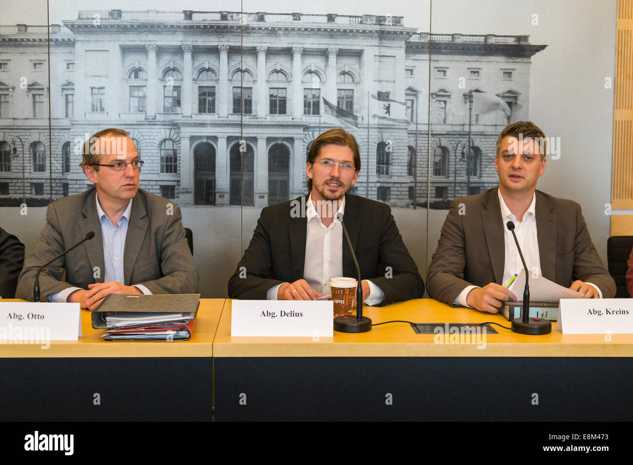 Berlin, Germany. 10th October, 2014. Press conference after the 1st investigative committee “BER” Airport with Martin Delius (Pirate party), chairman of the committee, realized at the Lower House of Berlin on 10th October, 2014 in Berlin. / Picture: (l to r) Andreas Otto (Bündnis 90 / Die Grünen), Martin Delius (Pirate party), Ole Kreins (SPD) Credit:  Reynaldo Chaib Paganelli/Alamy Live News Stock Photo