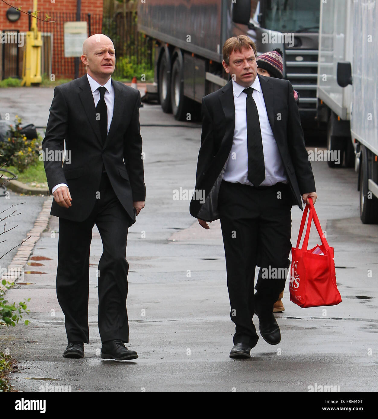 Eastenders cast film scenes for Lucy Beale's funeral  Featuring: Adam Woodyatt,Jake Wood Where: London, United Kingdom When: 07 Apr 2014 Stock Photo