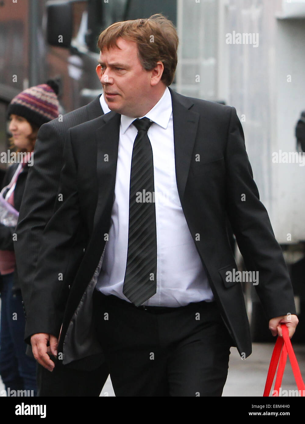 Eastenders cast film scenes for Lucy Beale's funeral  Featuring: Adam Woodyatt Where: London, United Kingdom When: 07 Apr 2014 Stock Photo