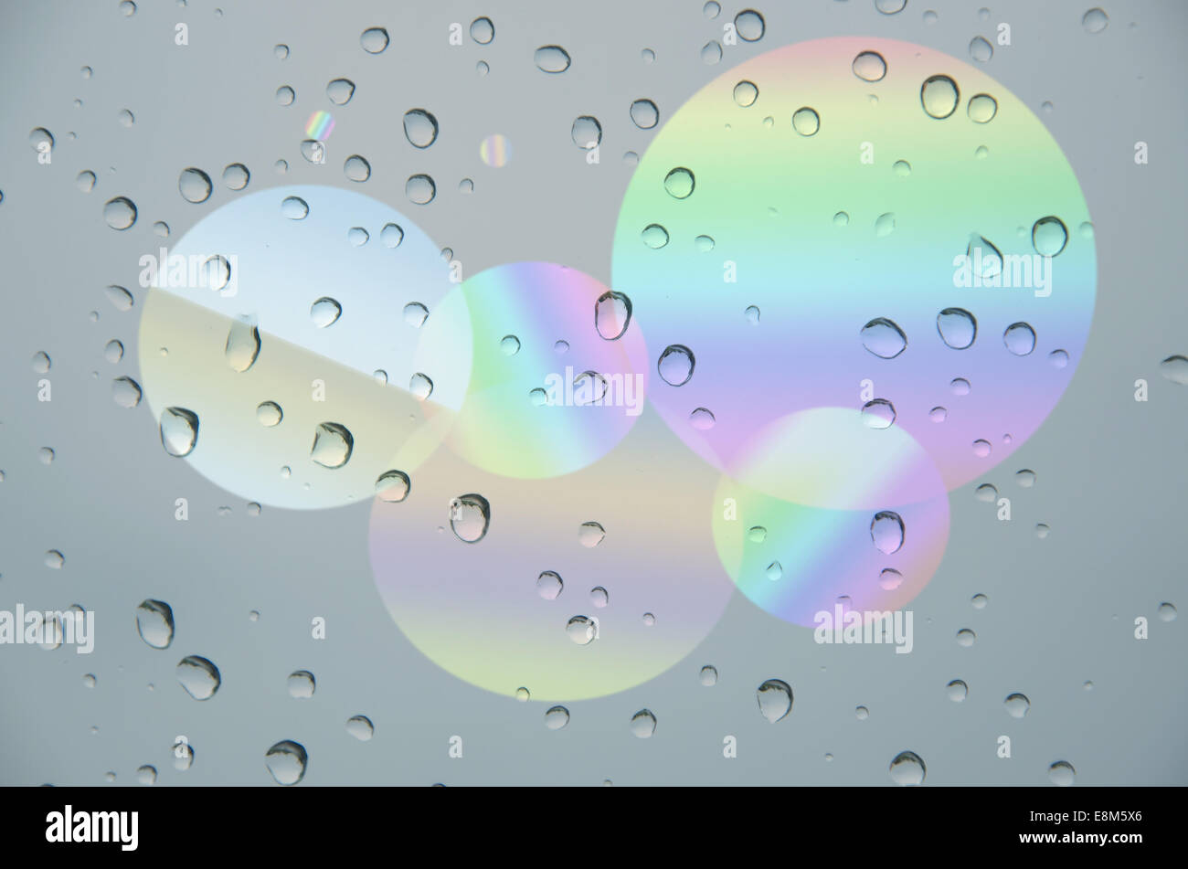drop water with circle rainbow  background Stock Photo