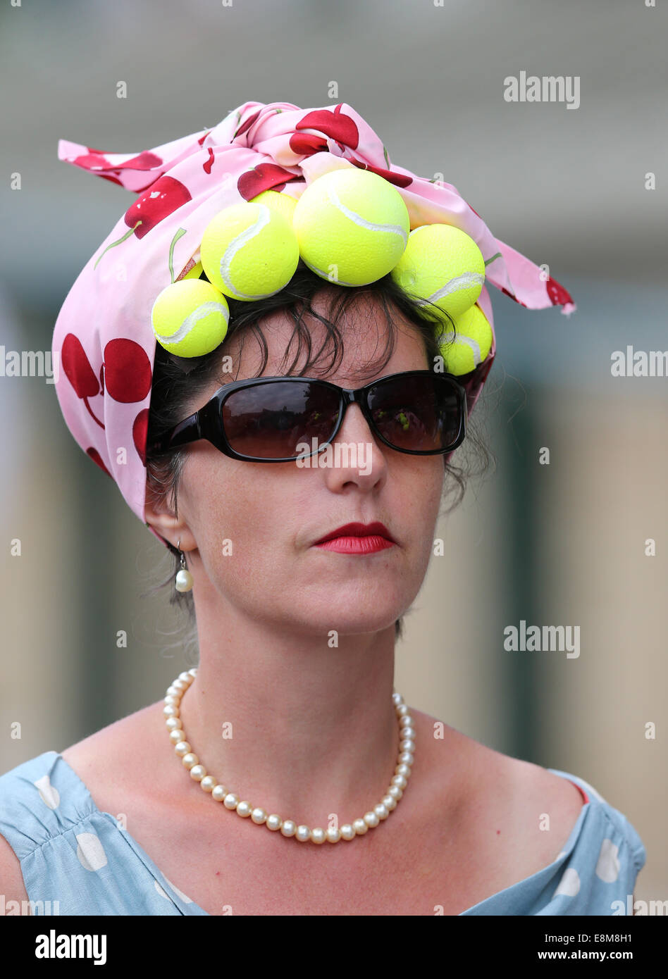 Woman with funny headdress at the Wimbledon Championships 2014 Stock