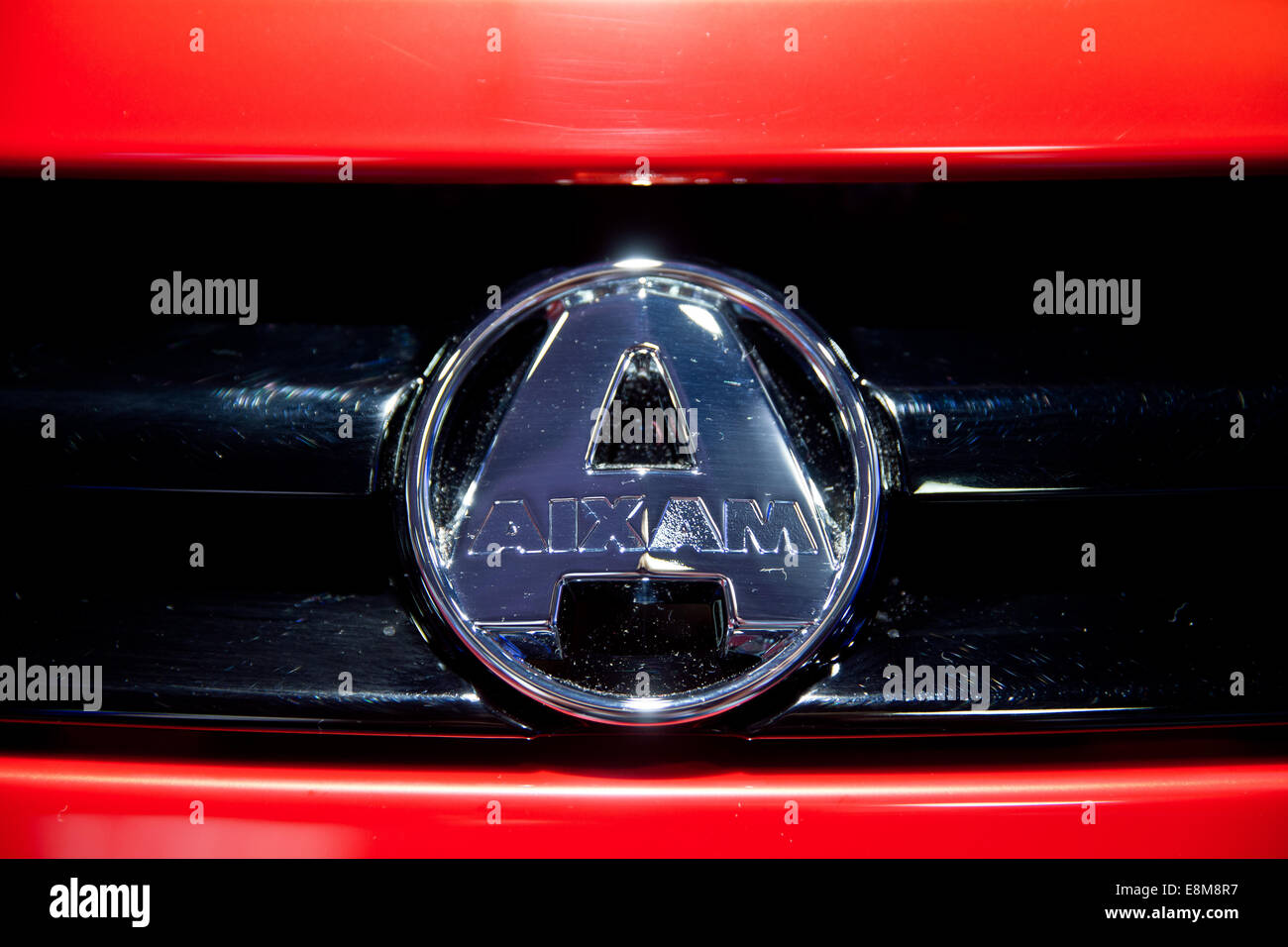 Paris, France. 4th Oct, 2014. The logo of Aixam is pictured during the Paris Motor Show (Mondial de l'Automobile) in Paris, France, 4 October 2014. Photo: Daniel Karmann/dpa/Alamy Live News Stock Photo