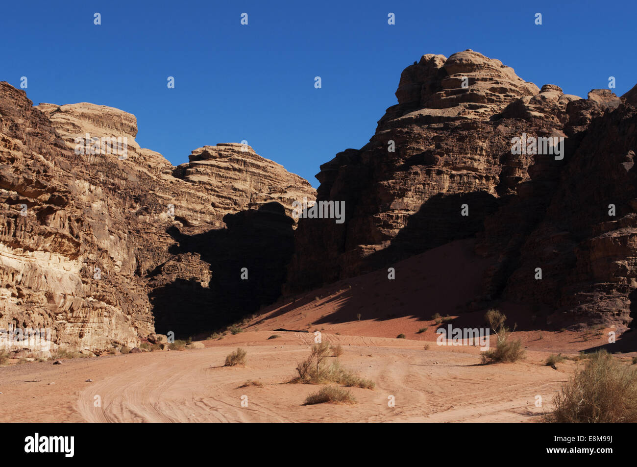 Rocks in the desert of the Wadi Rum, known as Valley of the Moon, a famous worldwide valley cut into sandstone and granite rock, looking like Mars Stock Photo
