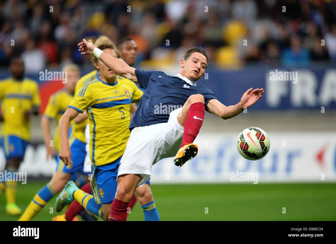 Stade Le Mans, Le Mans, France. 10th Oct, 2014. U23 International football. Euro 2015 Qualification match between France and Sweden. Florian Thauvin (fra) - Ludwig Augustinsson (swe) Credit:  Action Plus Sports/Alamy Live News Stock Photo