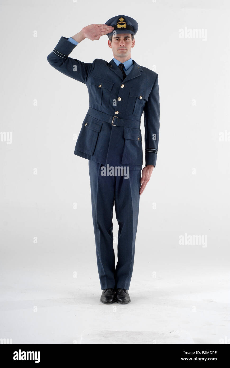 man in comedy costume fancy dress as a royal air force fighter pilot captain in full military uniform Stock Photo