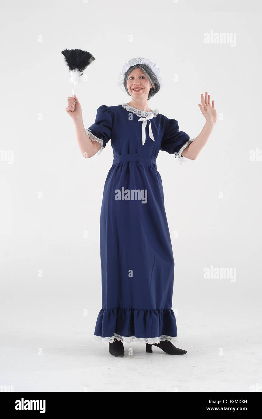 lady in fancy dress comedy costume as a washer woman, cleaning lady in