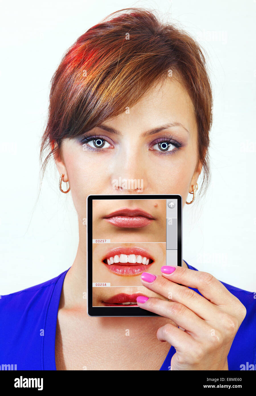 beautiful female android holds digital device on her hand Stock Photo ...