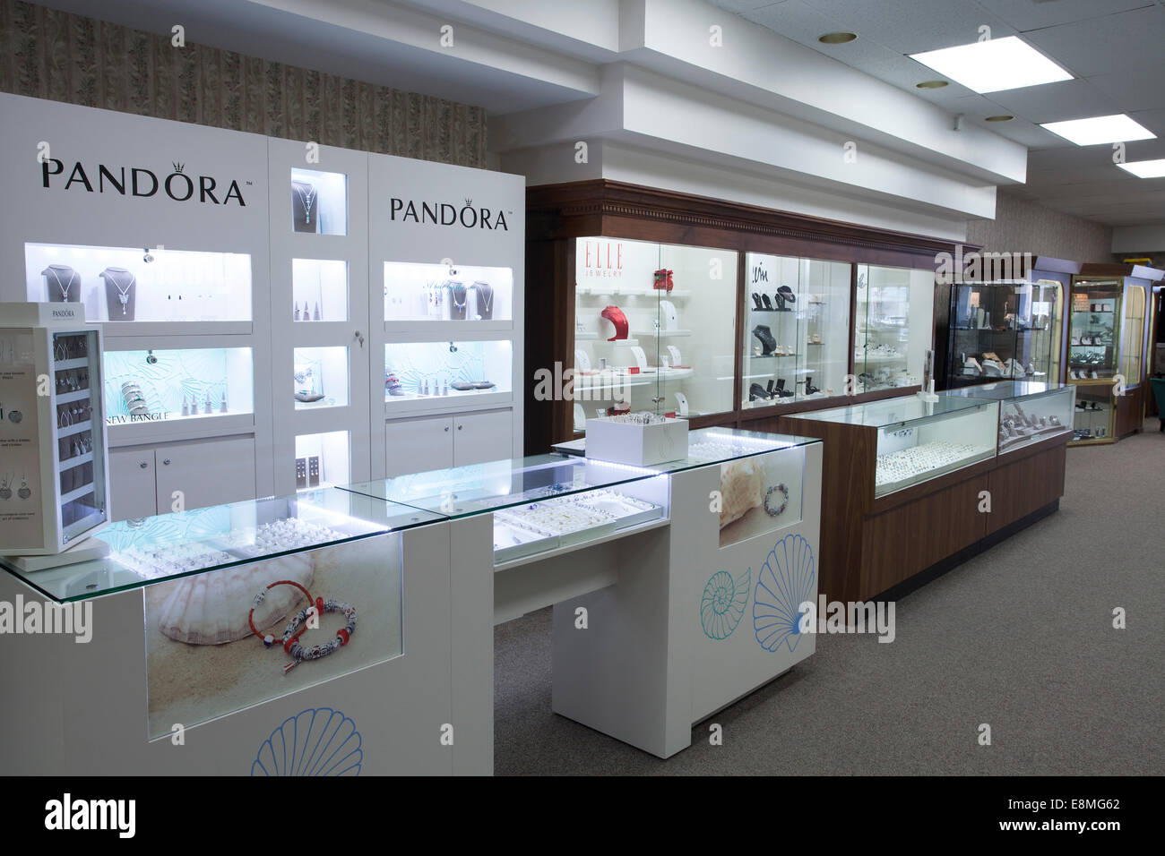 Interior of jewelry store with illuminated displays. Stock Photo