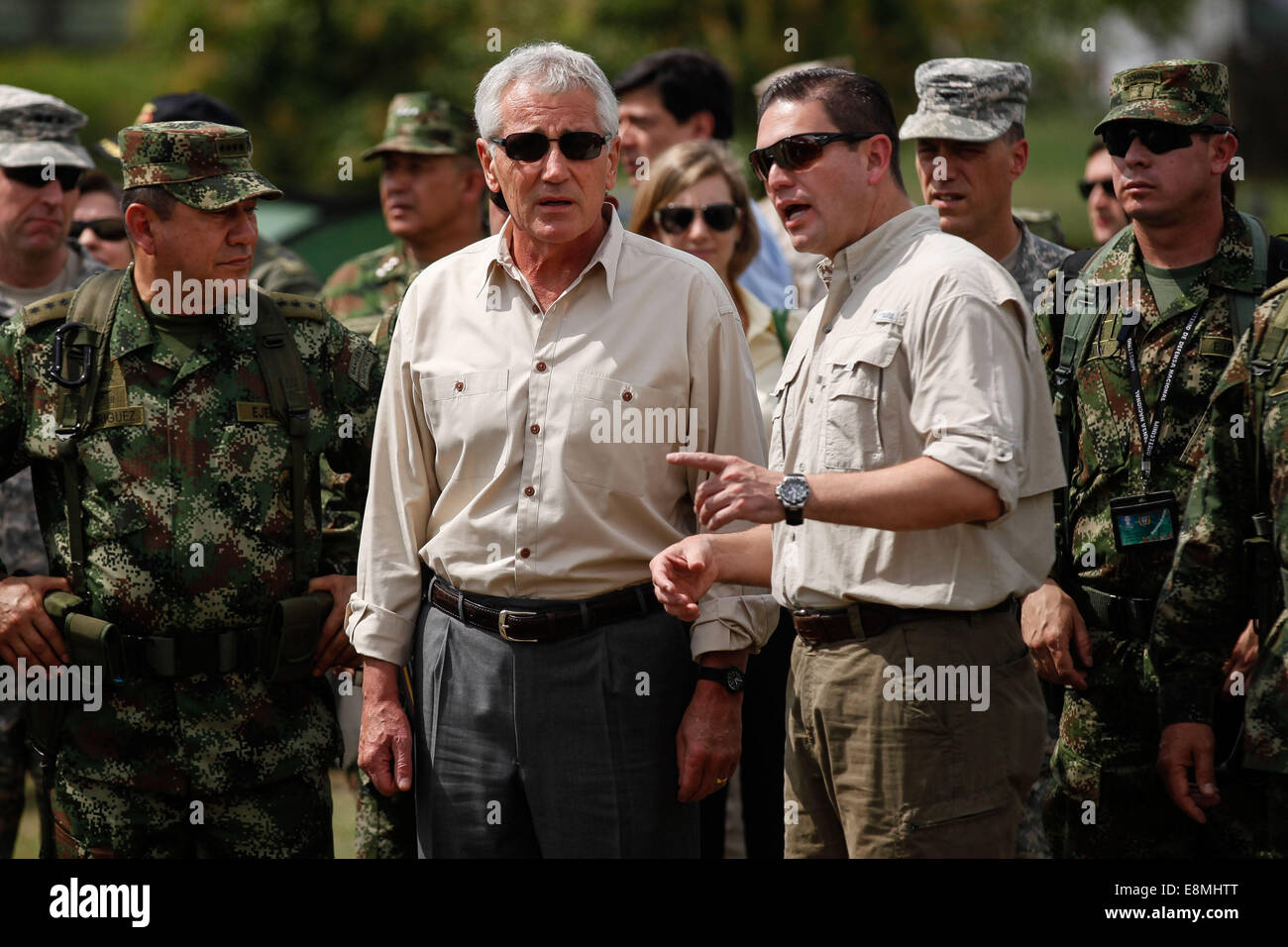 Melgar, Colombia. 10th Oct, 2014. U.S. Defense Secretary Chuck Hagel (C), accompanied by Colombia's Defense Minister Juan Carlos Pinzon (R Front), visits the Tolemaida batallion in Melgar, Colombia, on Oct. 10, 2014. Credit:  Jhon Paz/Xinhua/Alamy Live News Stock Photo