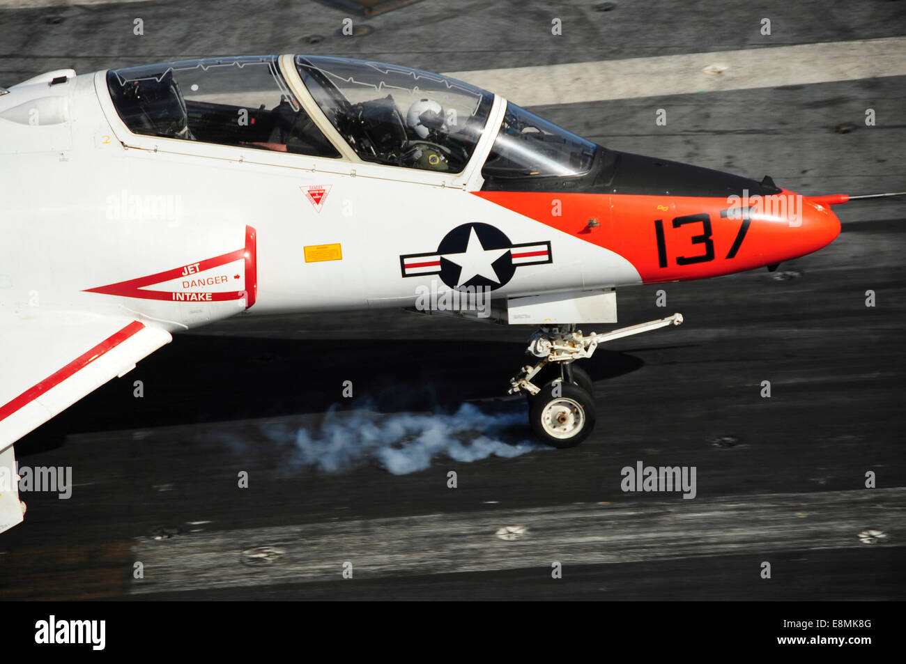 Atlantic Ocean, December 10, 2013 - A T-45C Goshawk lands on the flight deck of the aircraft carrier USS Theodore Roosevelt (CVN Stock Photo