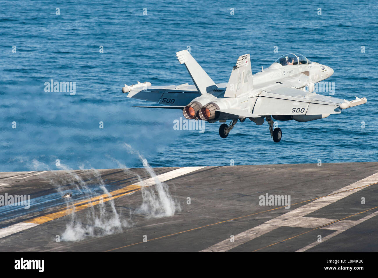 Gulf of Oman, March 19, 2014 - An EA-18G Growler launches from the flight deck of the aircraft carrier USS Harry S. Truman (CVN Stock Photo