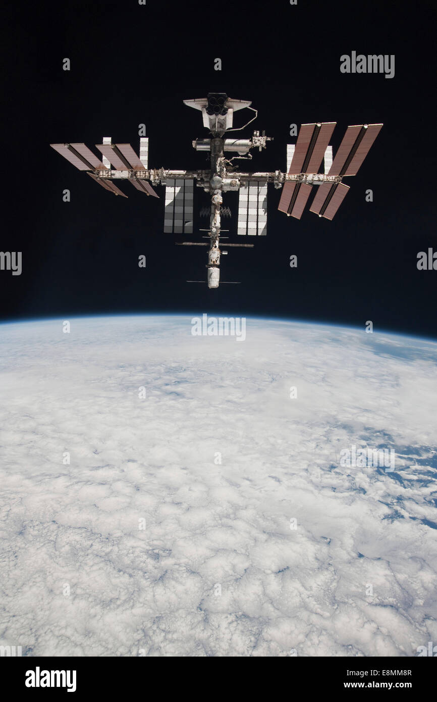 May 23, 2011 - The International Space Station and docked Space Shuttle Endeavour, backdropped by Earth and the blackness of spa Stock Photo