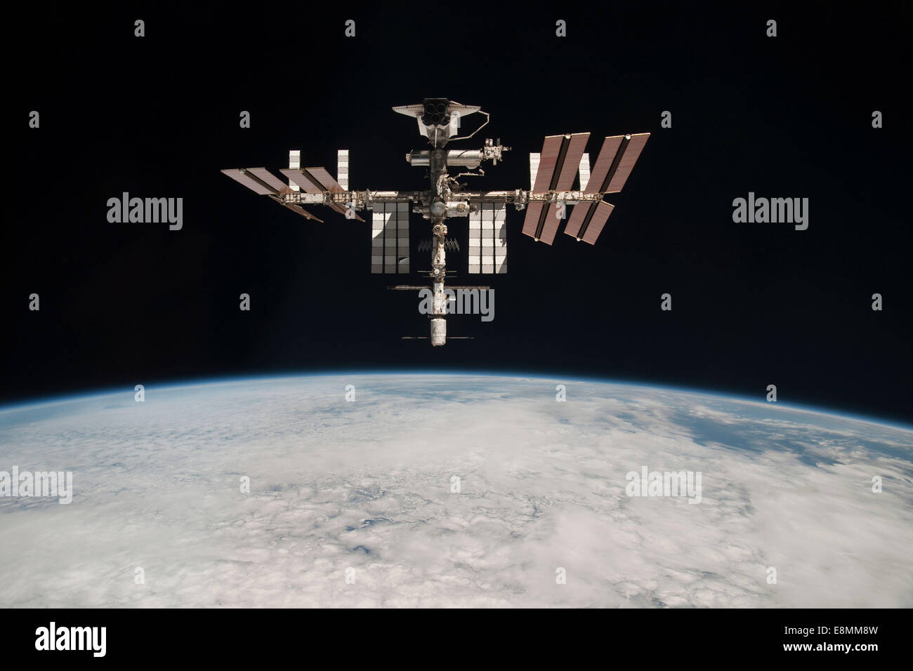 May 23, 2011 - The International Space Station and docked Space Shuttle Endeavour, backdropped by Earth and the blackness of spa Stock Photo