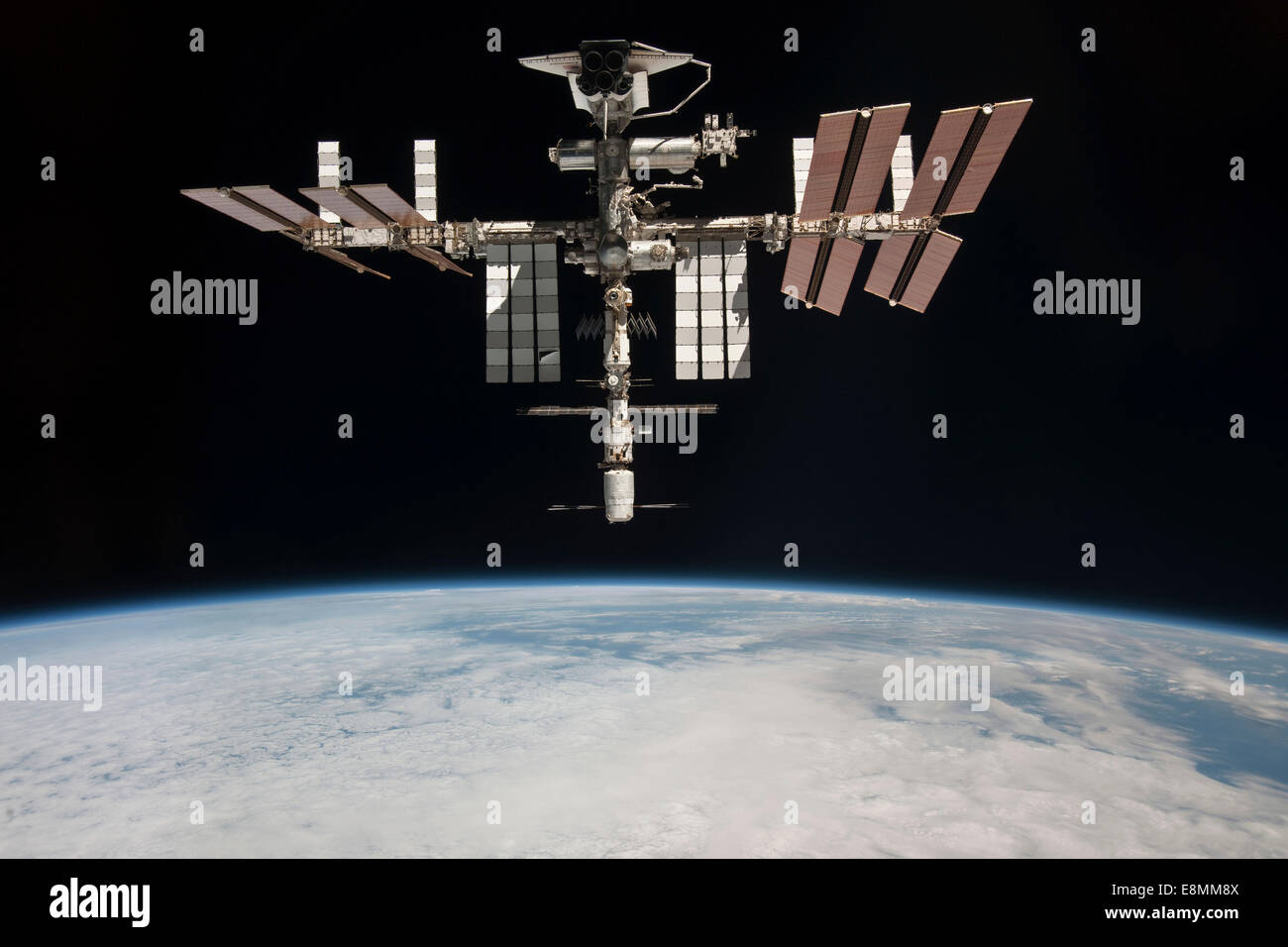 May 23, 2011 - The International Space Station and docked Space Shuttle Endeavour, backdropped by Earth and the blackness of spa Stock Photo